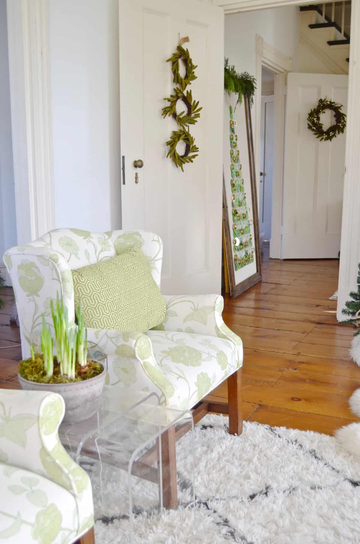 New England holiday house tour with lots of Christmas trees and classic red accents.