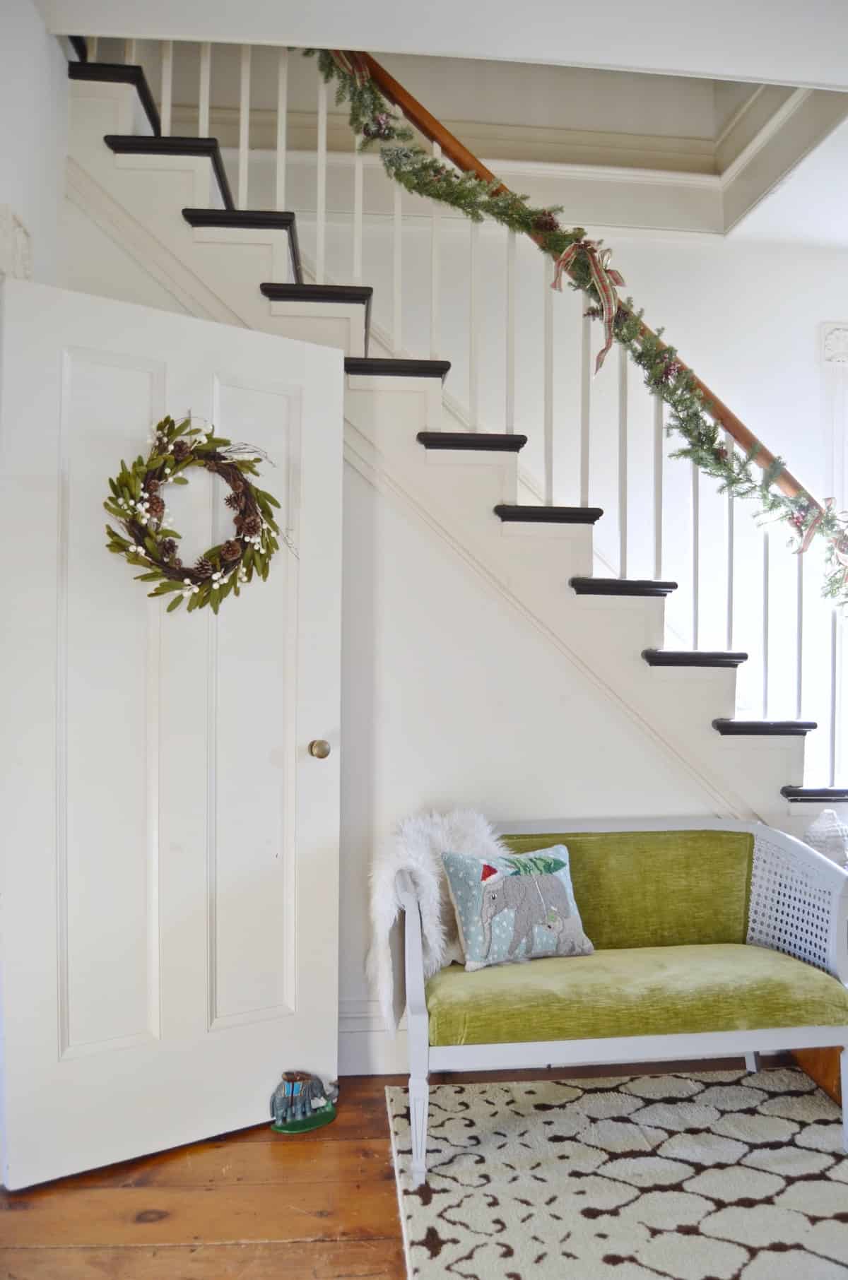 New England holiday house tour with lots of Christmas trees and classic red accents.