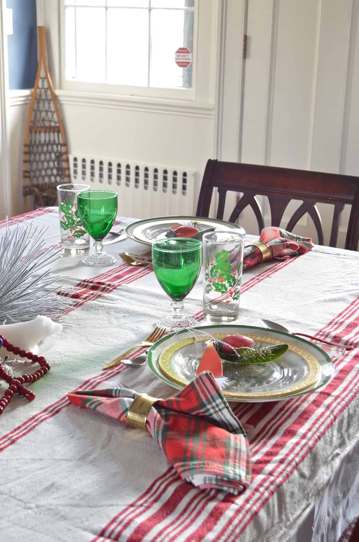 red and green christmas table for our eclectic blue and white dining room