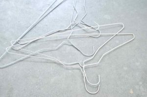 Make a simple, inexpensive spring wreath out of coat hangers!