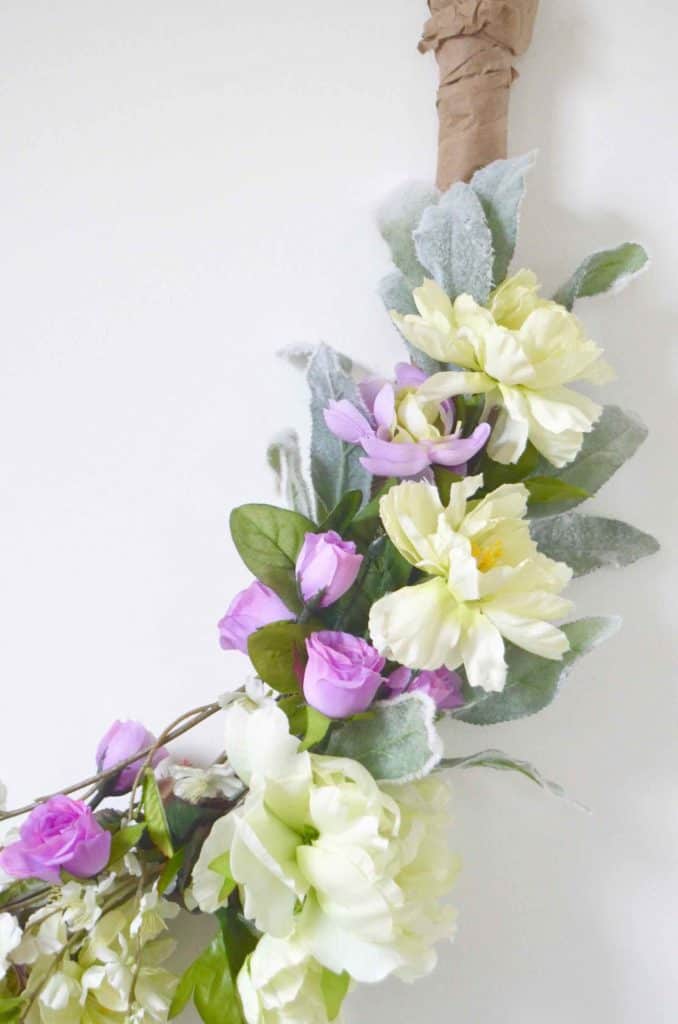 Make a simple, inexpensive spring wreath out of coat hangers!