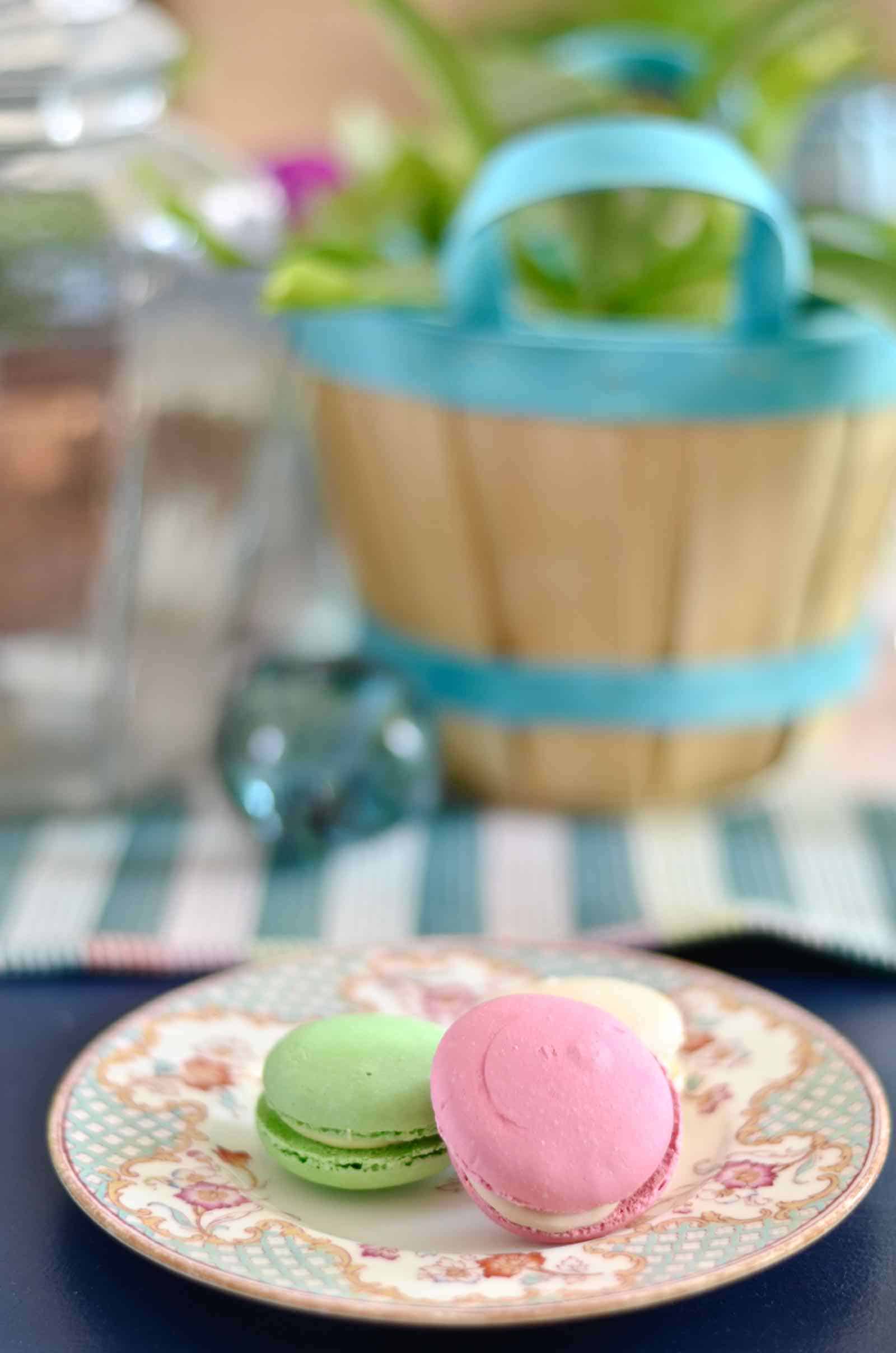 Lush coral and blue eclectic easter tablescape.