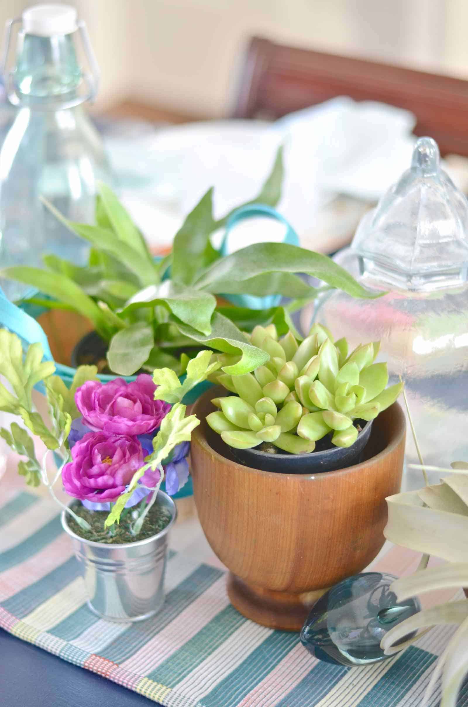 Lush coral and blue eclectic easter tablescape.