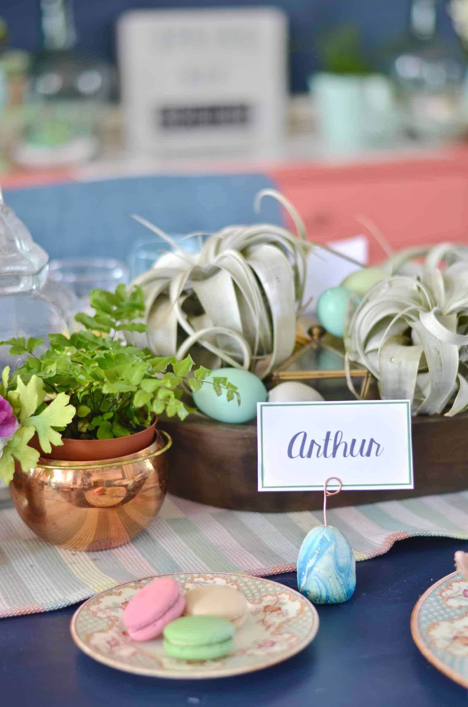 Lush coral and blue eclectic easter tablescape.