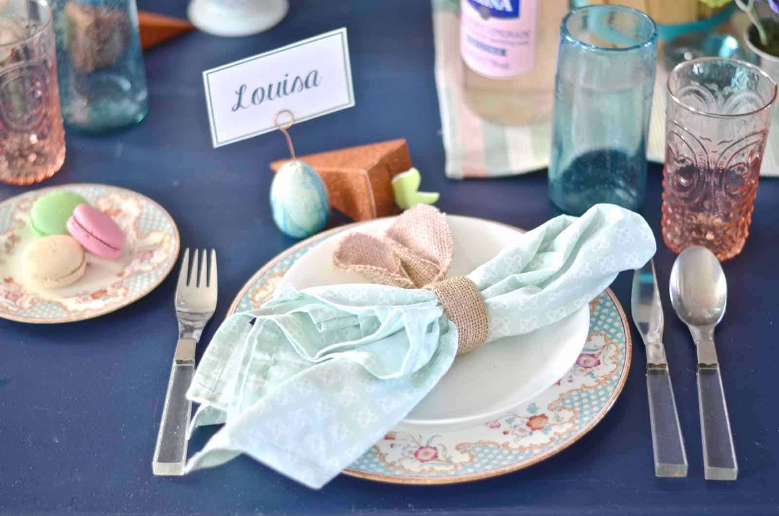 Lush coral and blue eclectic easter tablescape.
