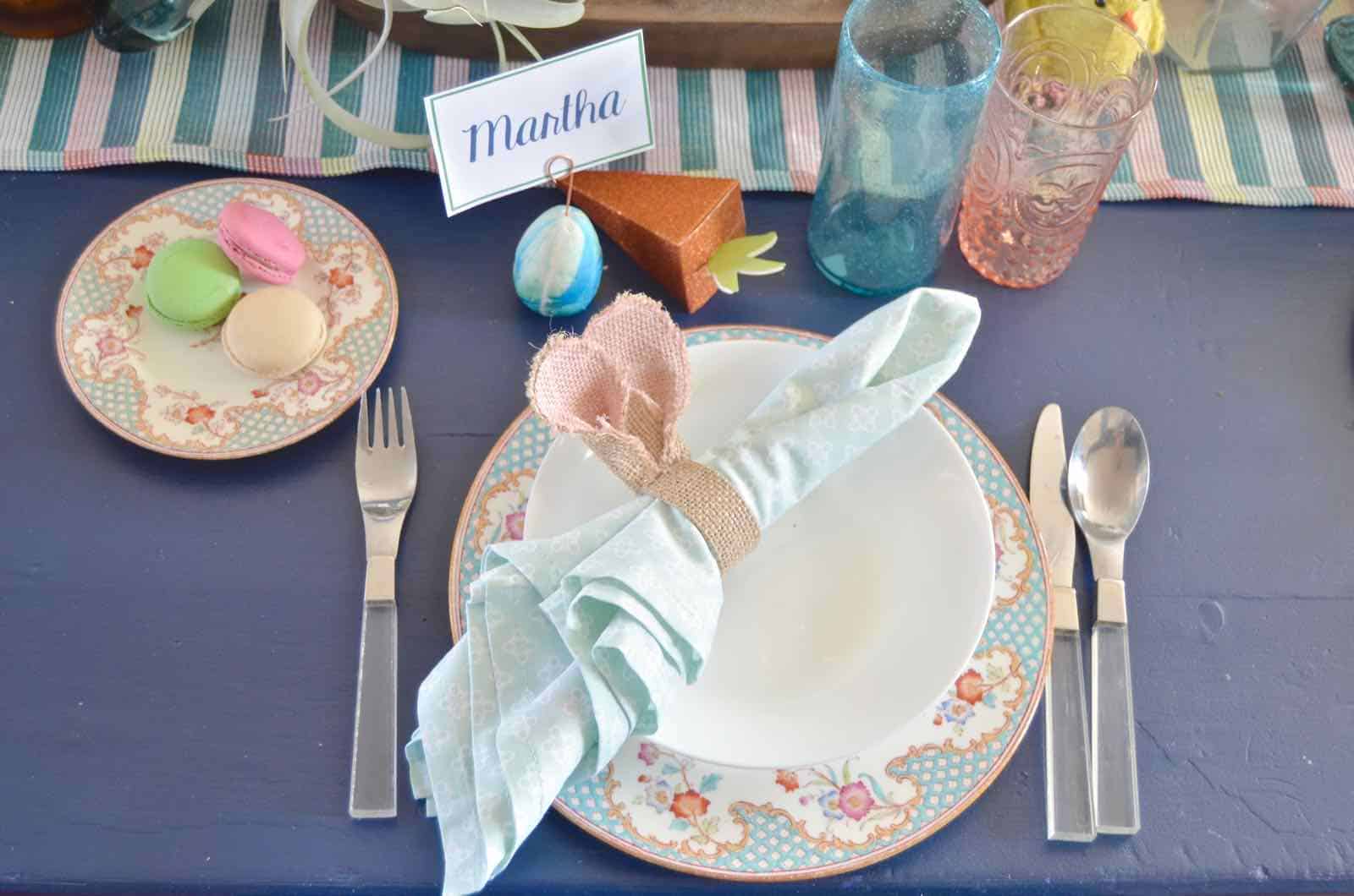 Lush coral and blue eclectic easter tablescape.