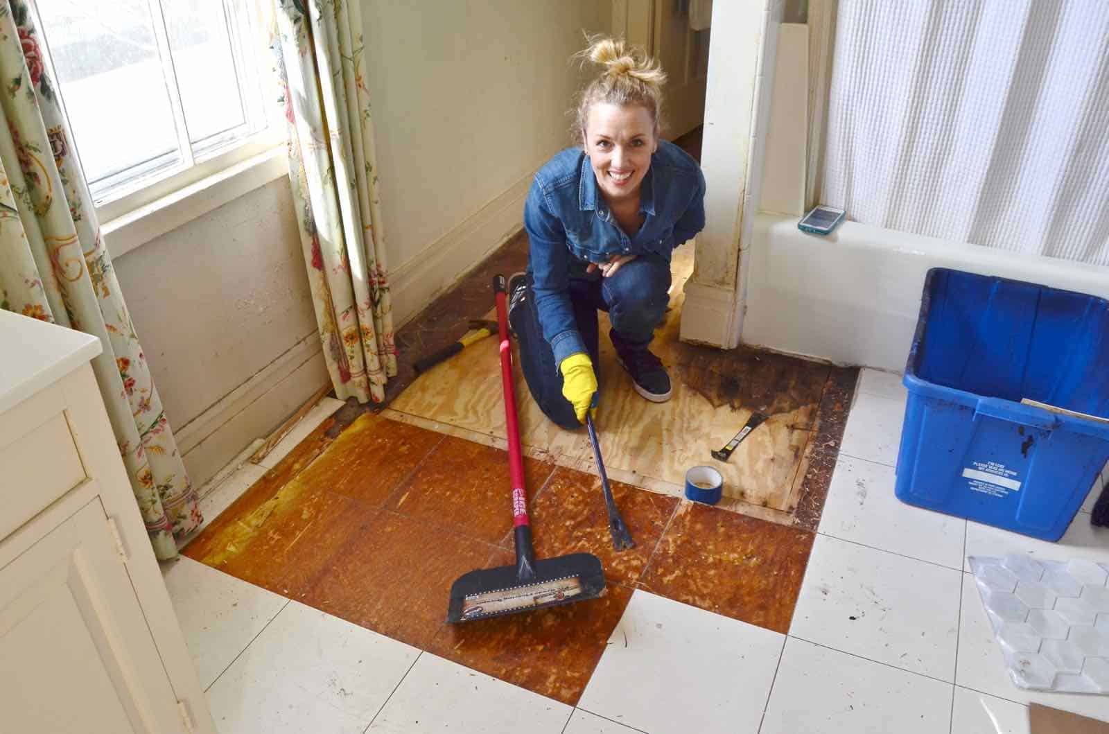 Working on the floor in the master bathroom.