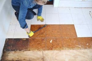 Working on the floor in the master bathroom.