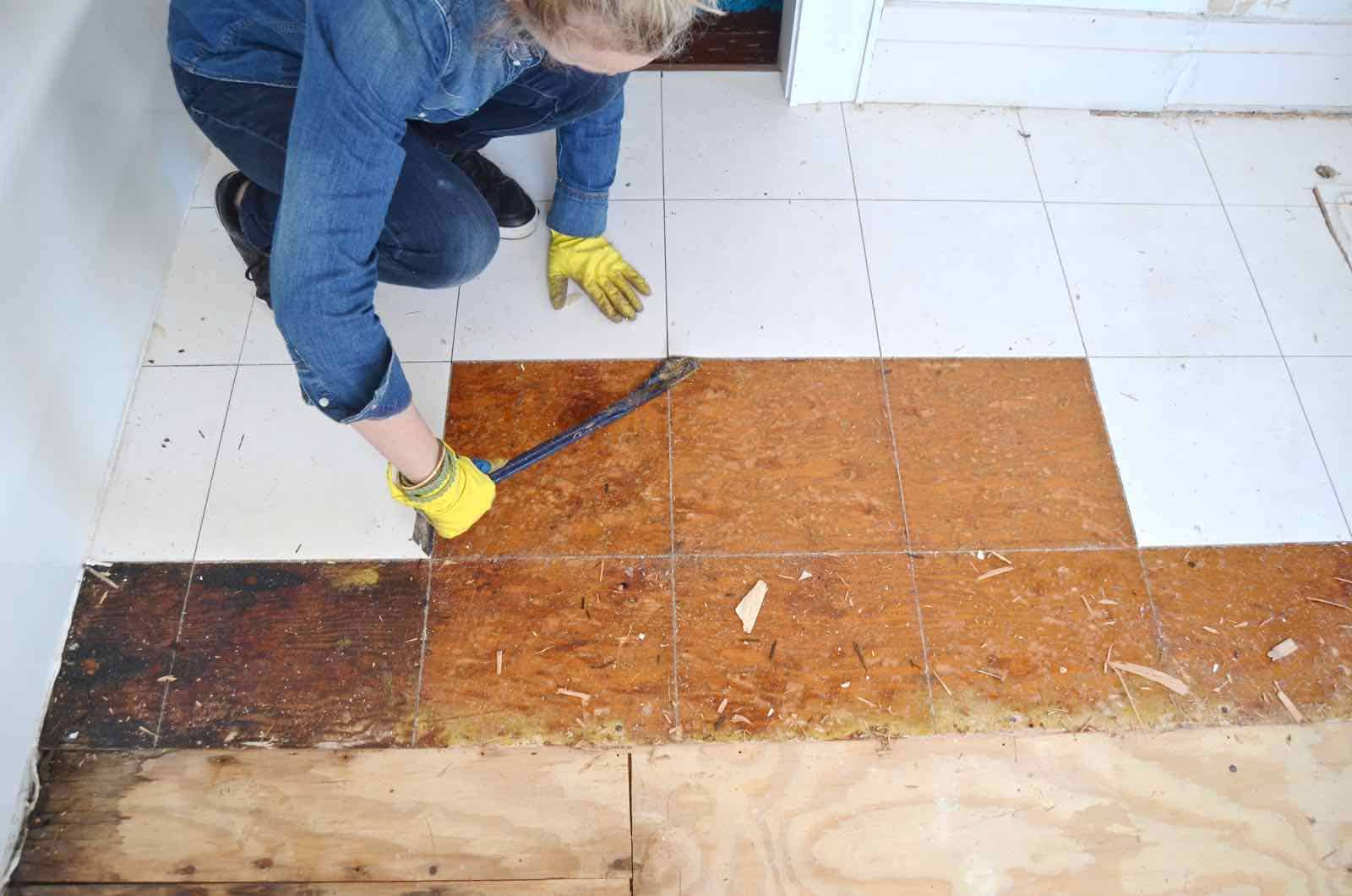 Working on the floor in the master bathroom.