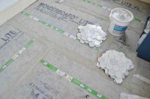 How to tile a bathroom floor... step by step guide!