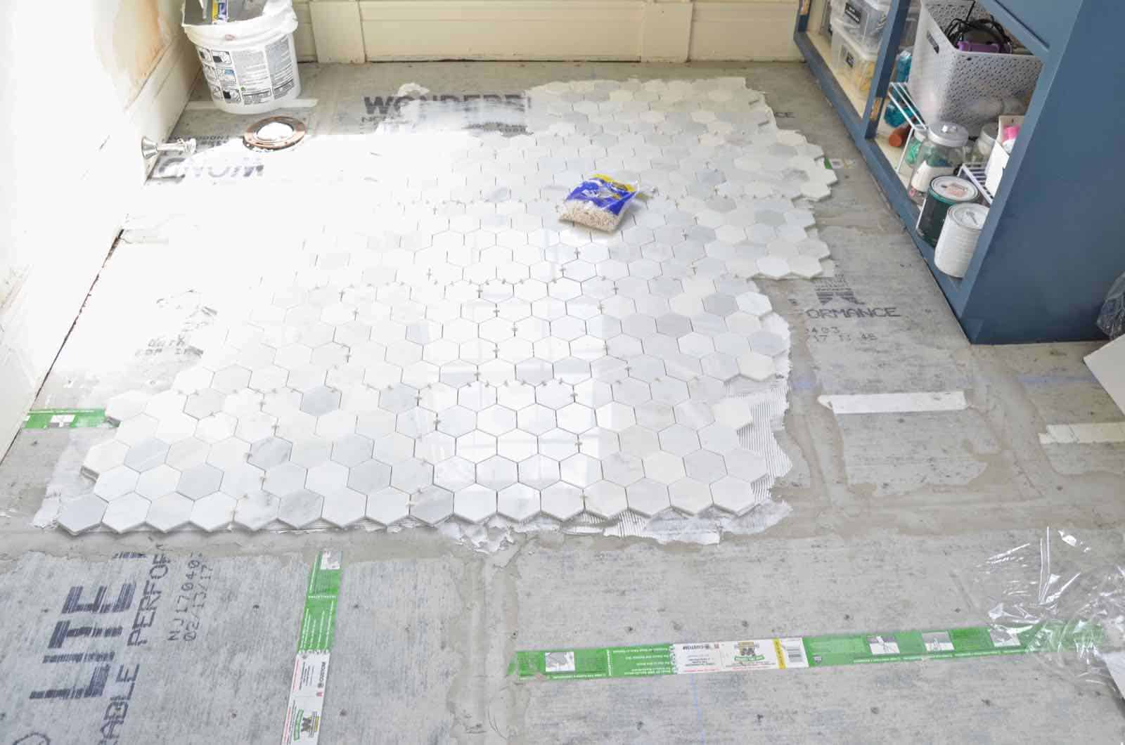 How to tile a bathroom floor... step by step guide!