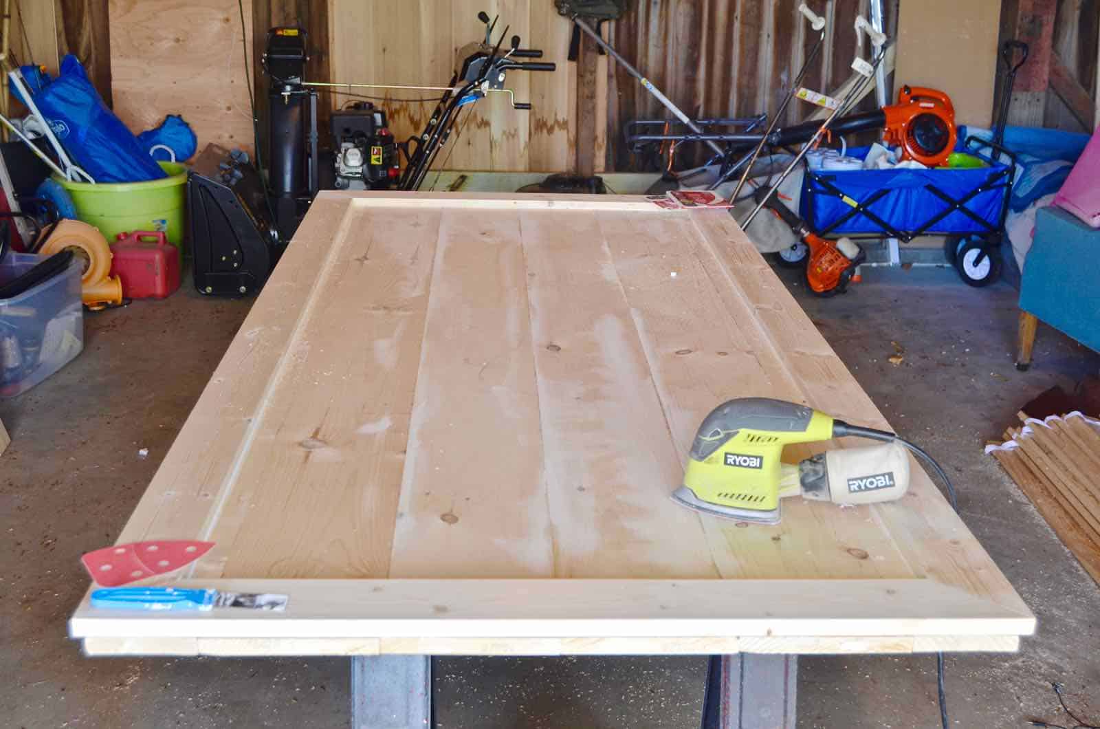 How to build a sliding barn door for under $50.