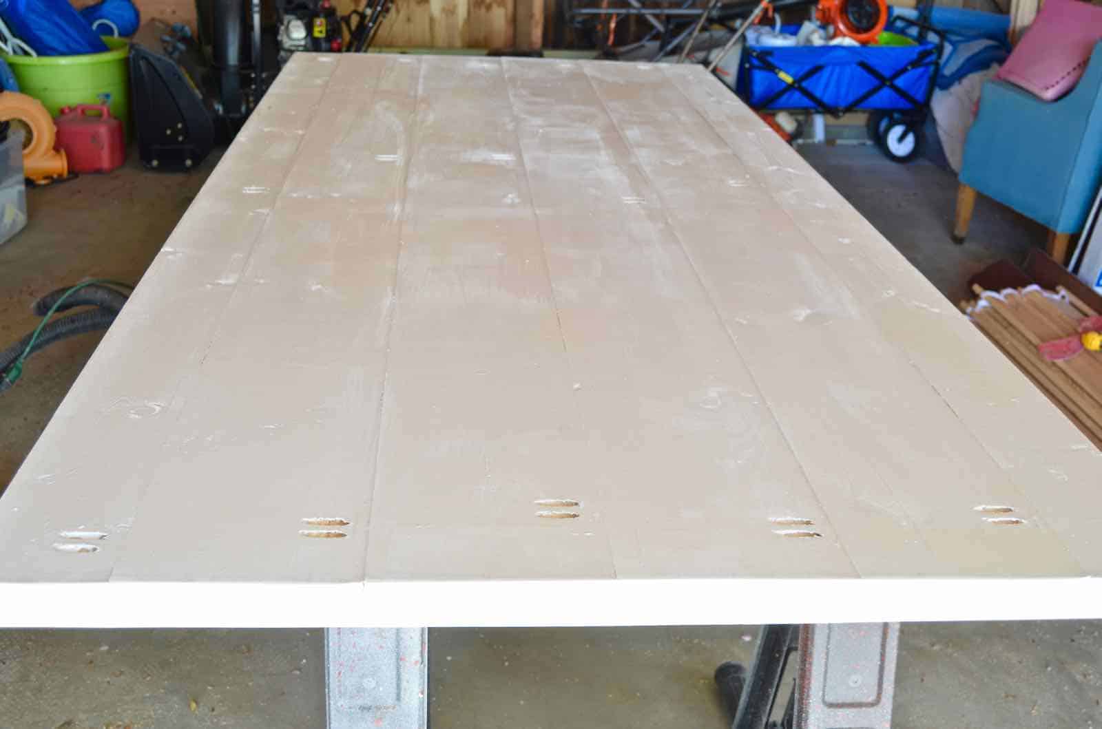 How to build a sliding barn door for under $50.