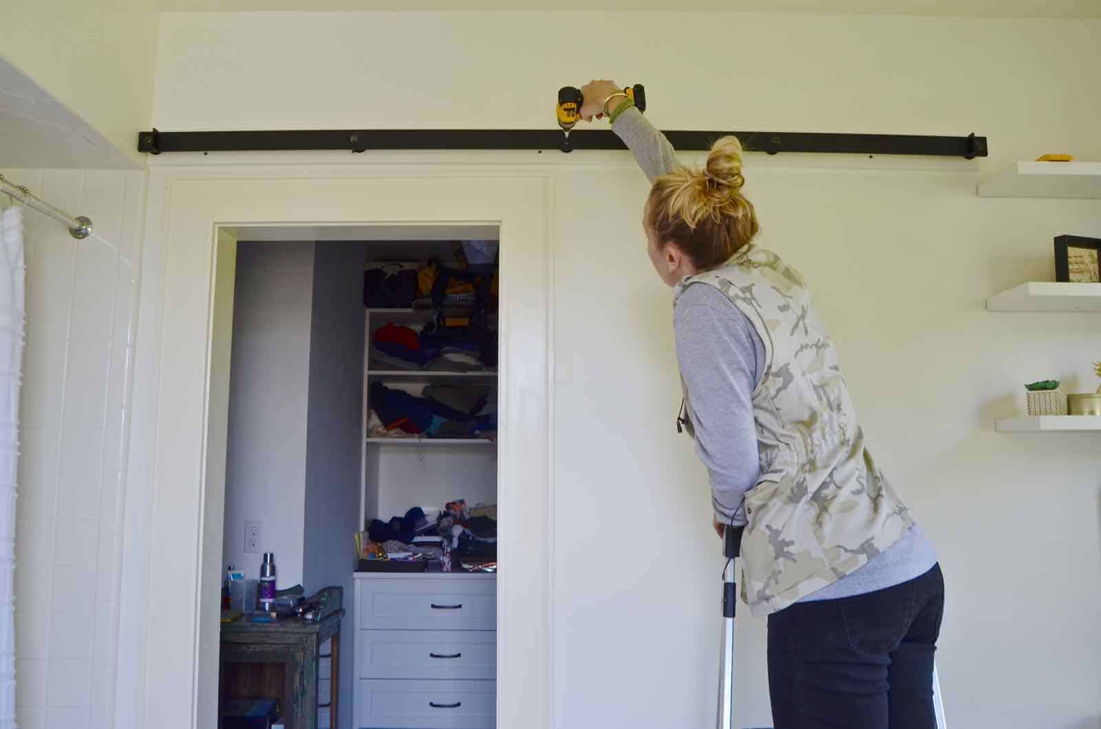 How to build a sliding barn door for under $50.