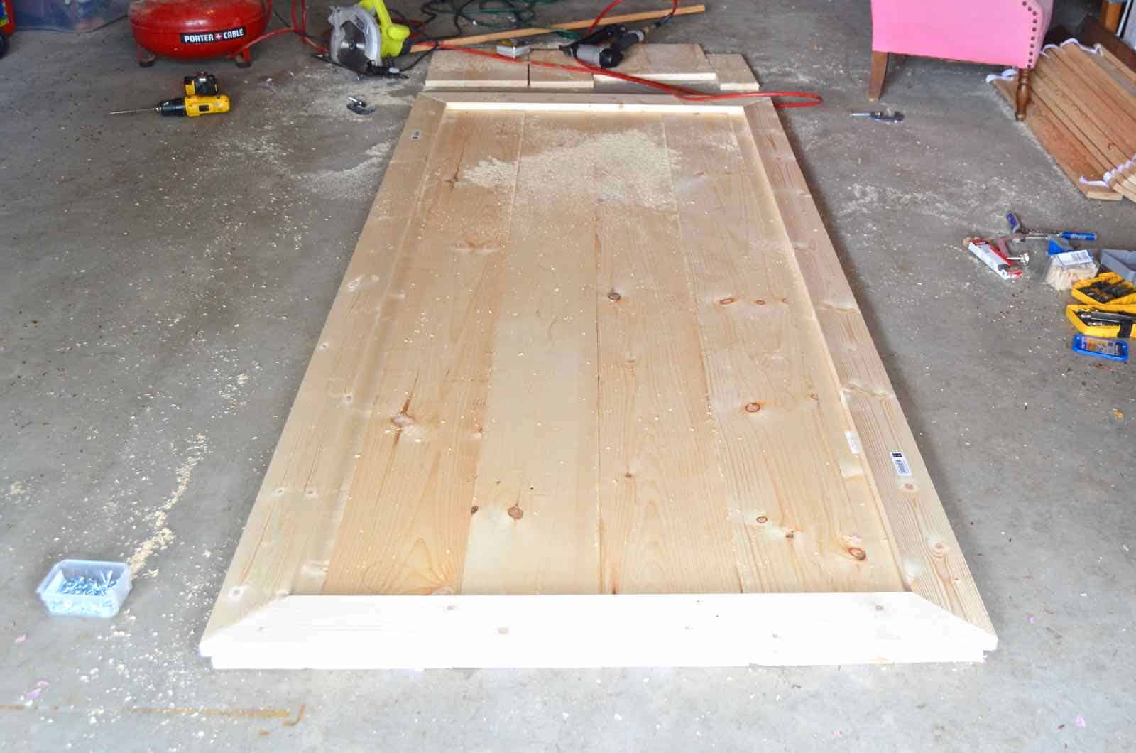 How to build a sliding barn door for under $50.