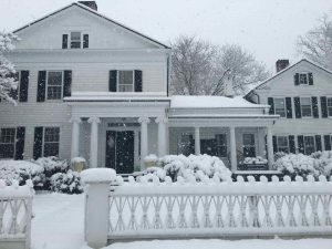 exterior of house in snow storm