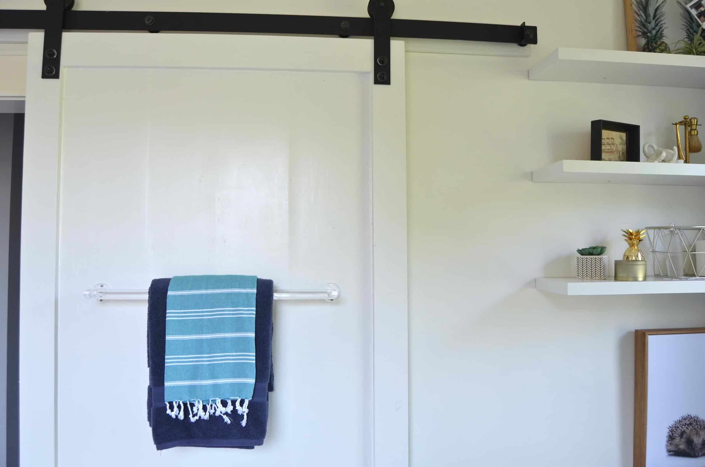 How to build a sliding barn door for under $50.