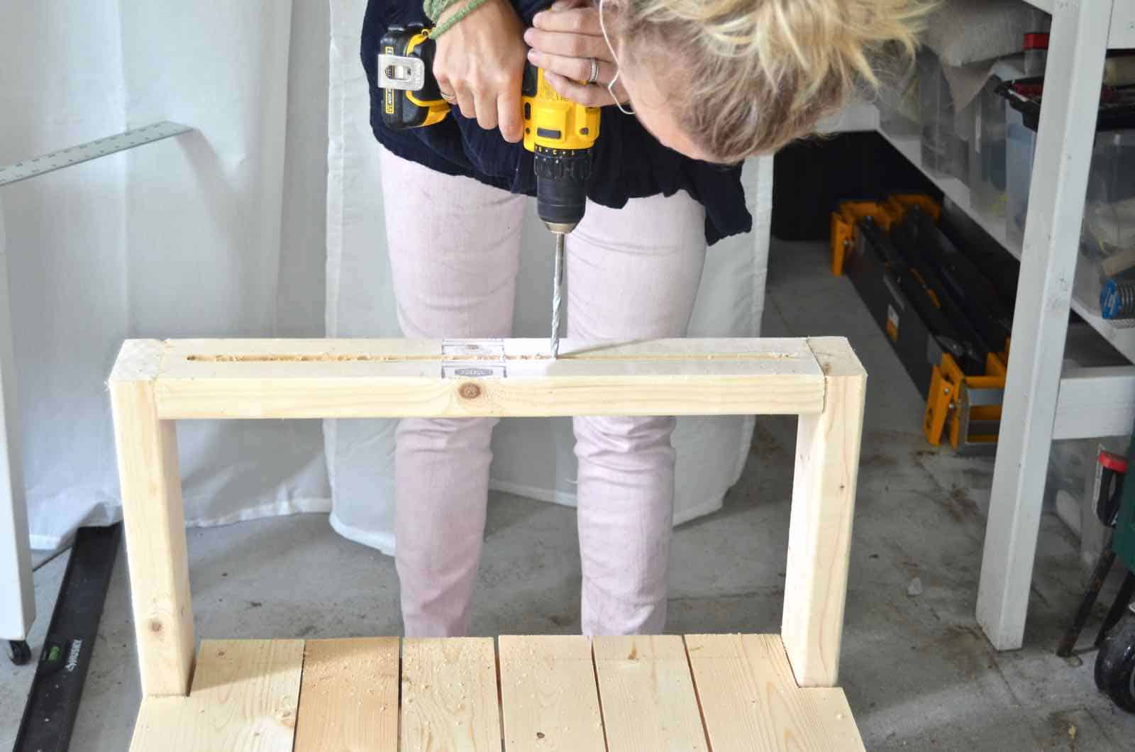 DIY bench made out of 2x4s with chic rope detail