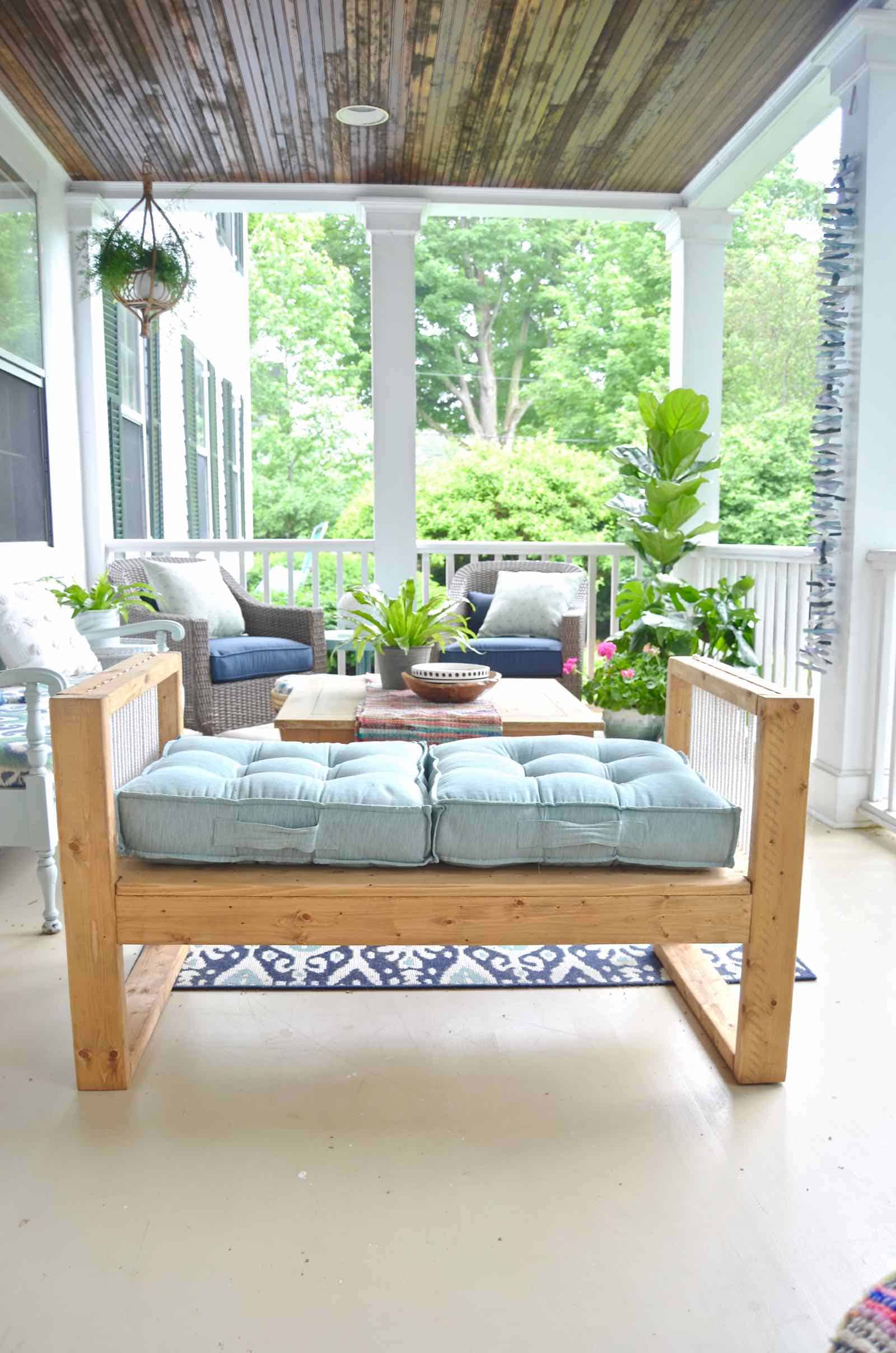 DIY bench made out of 2x4s with chic rope detail