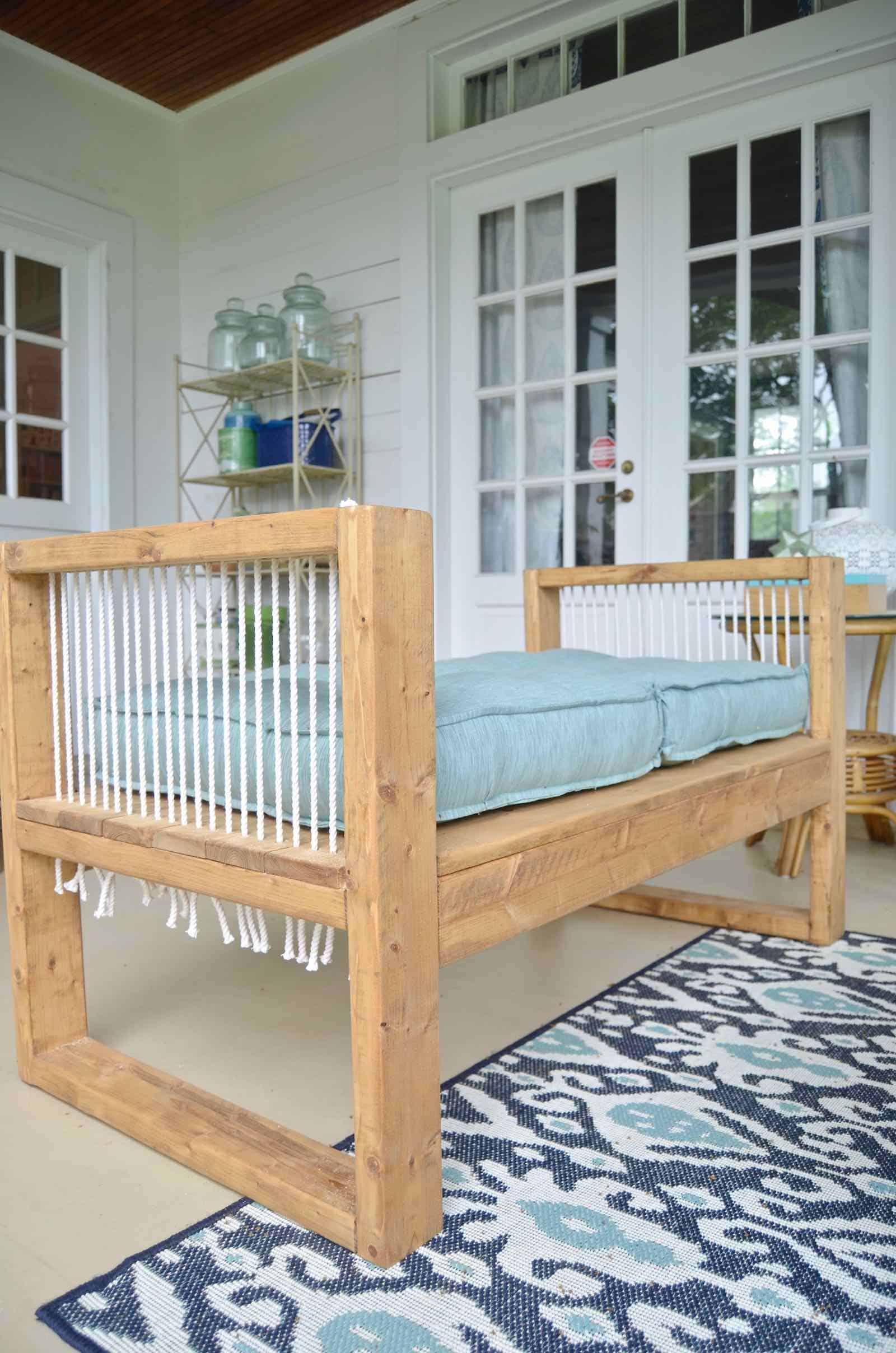 DIY bench made out of 2x4s with chic rope detail