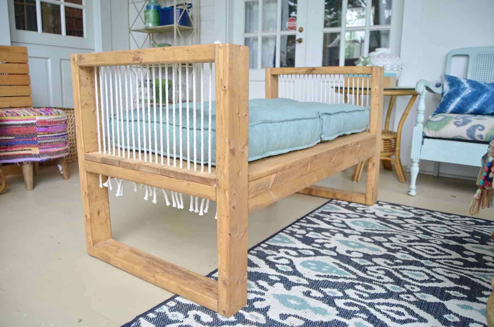 DIY bench made out of 2x4s with chic rope detail