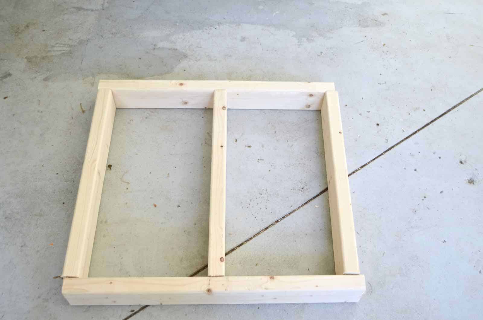 DIY bench made out of 2x4s with chic rope detail