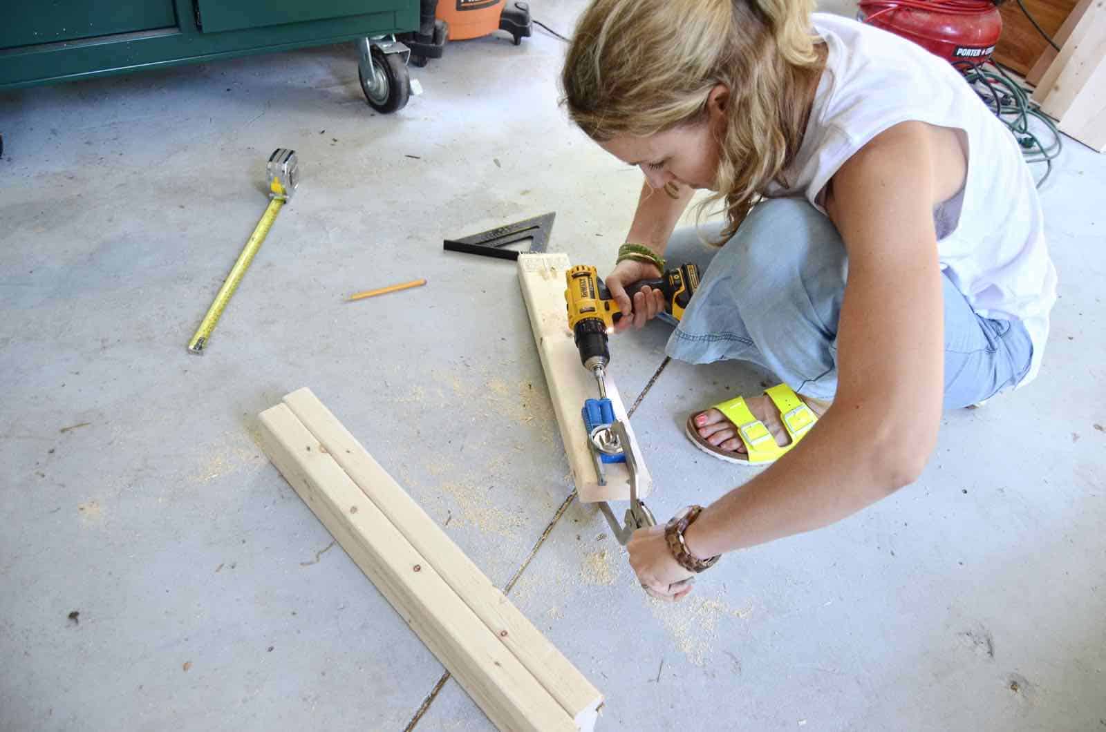 DIY bench made out of 2x4s with chic rope detail