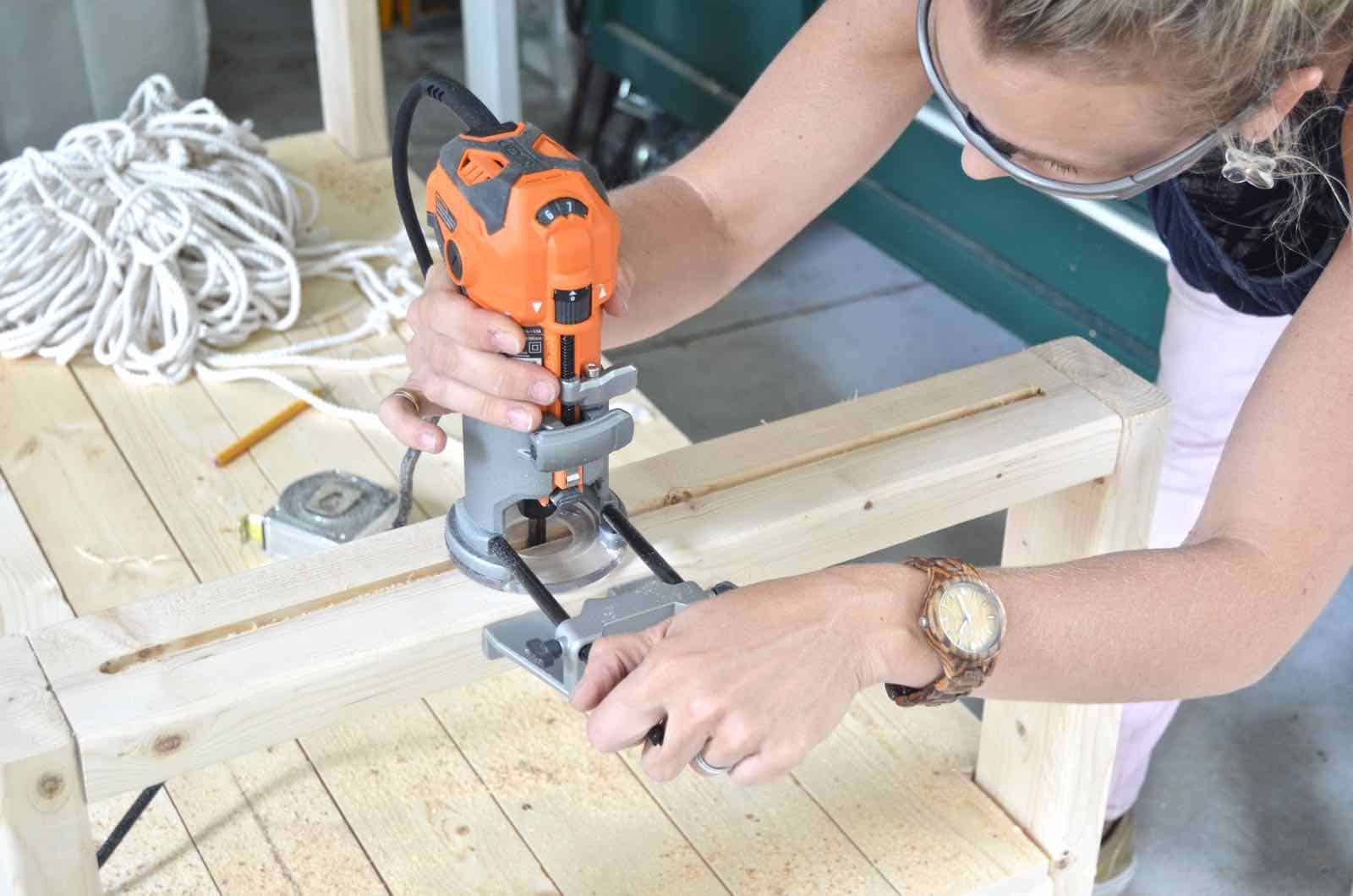 DIY bench made out of 2x4s with chic rope detail