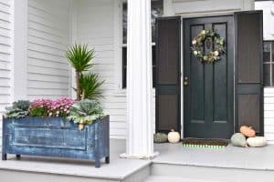 porch decorated for fall