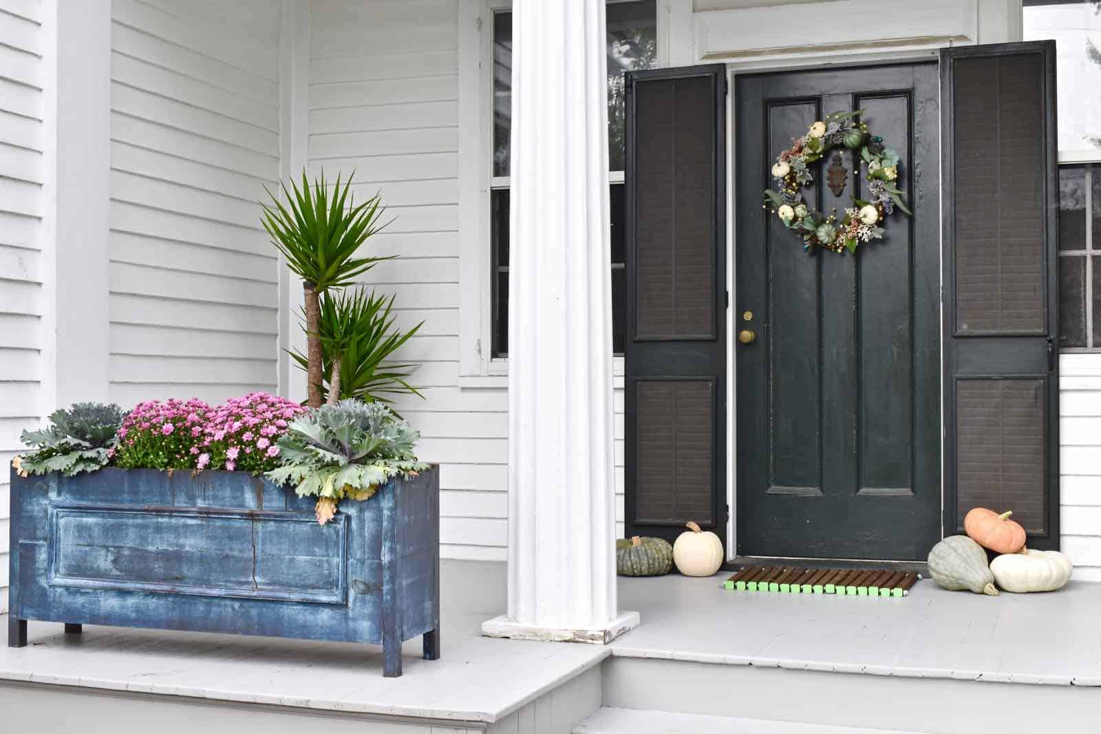 porch decorated for fall 