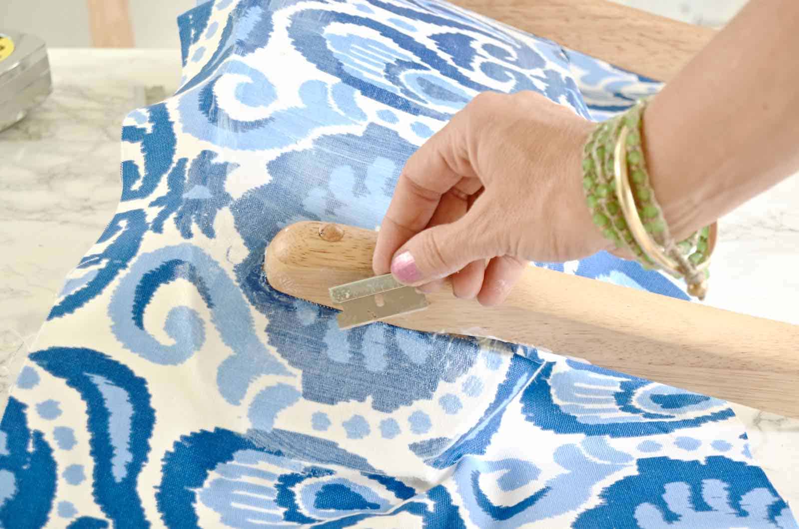 use a sharp blade to trim fabric around back rest