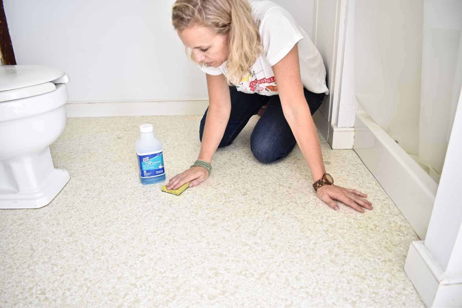 cleaning the bathroom floor with TSP