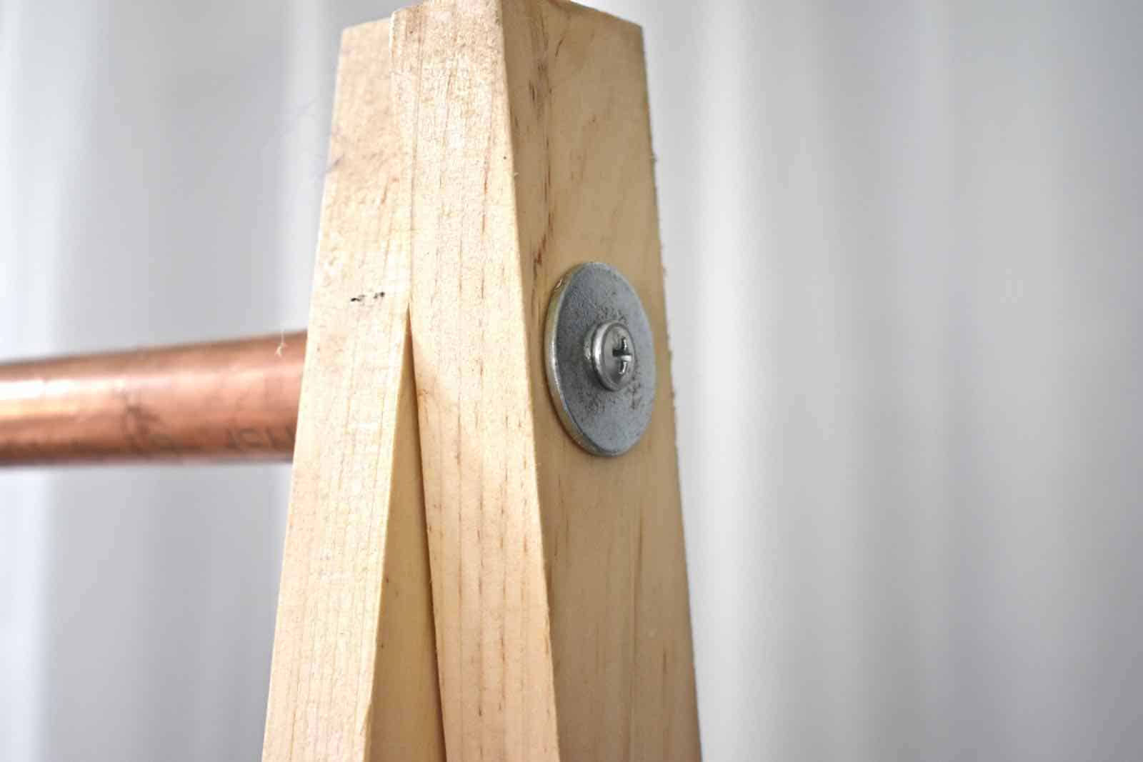 washer and screw to secure dowel