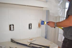 demoing tiles from backsplash