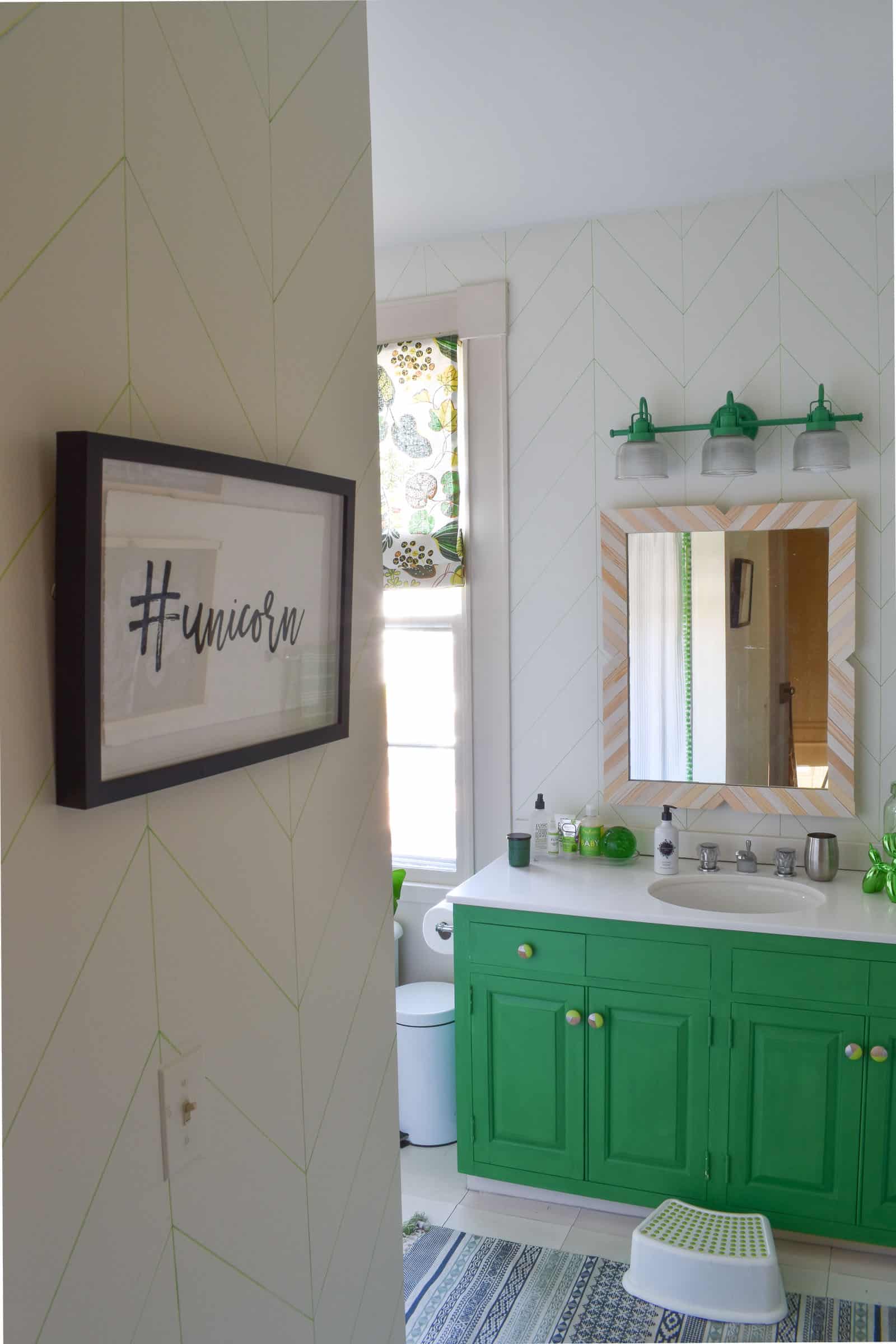 painted green vanity in bathroom