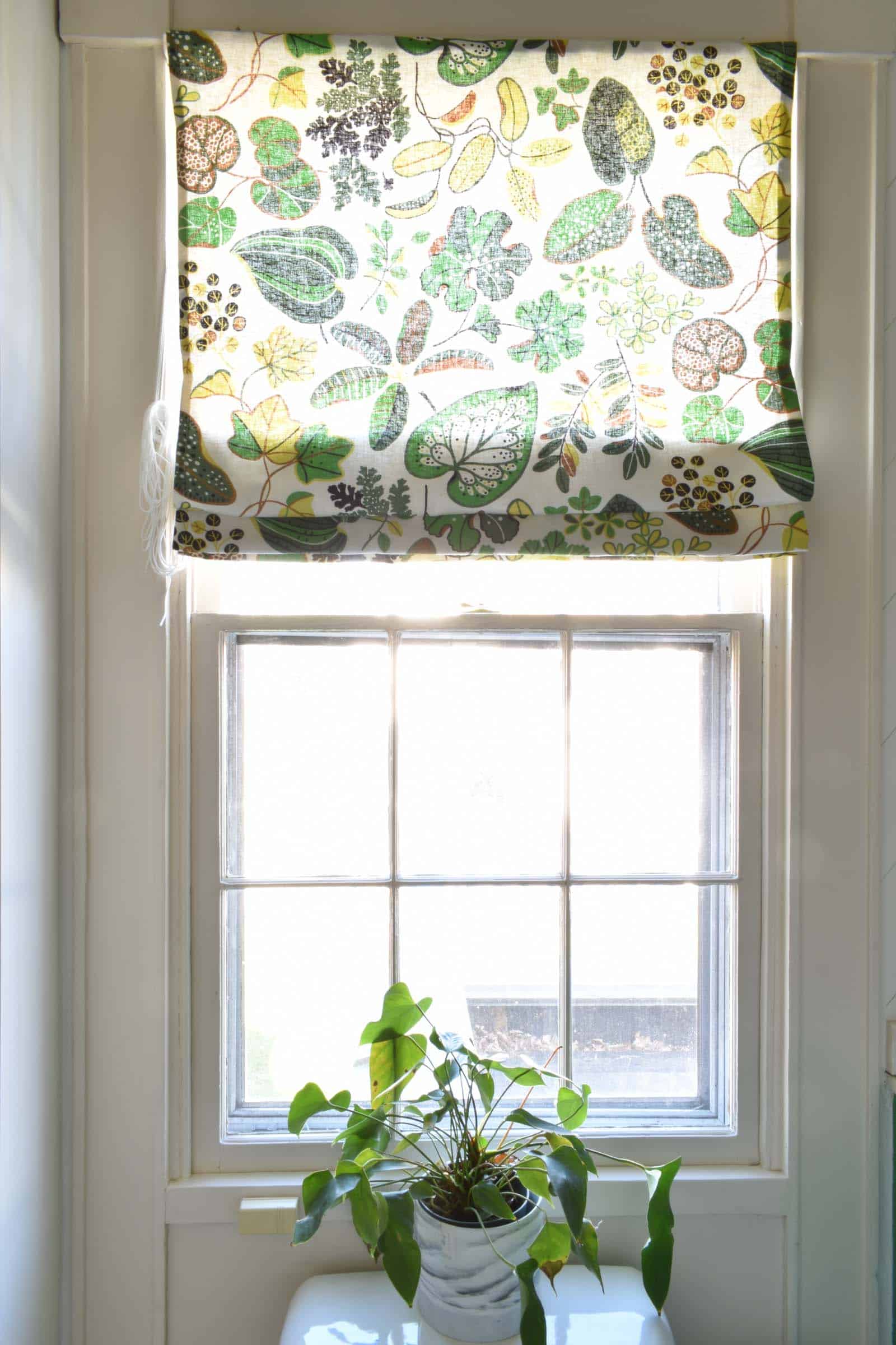 curtain turned roman shade in bathroom