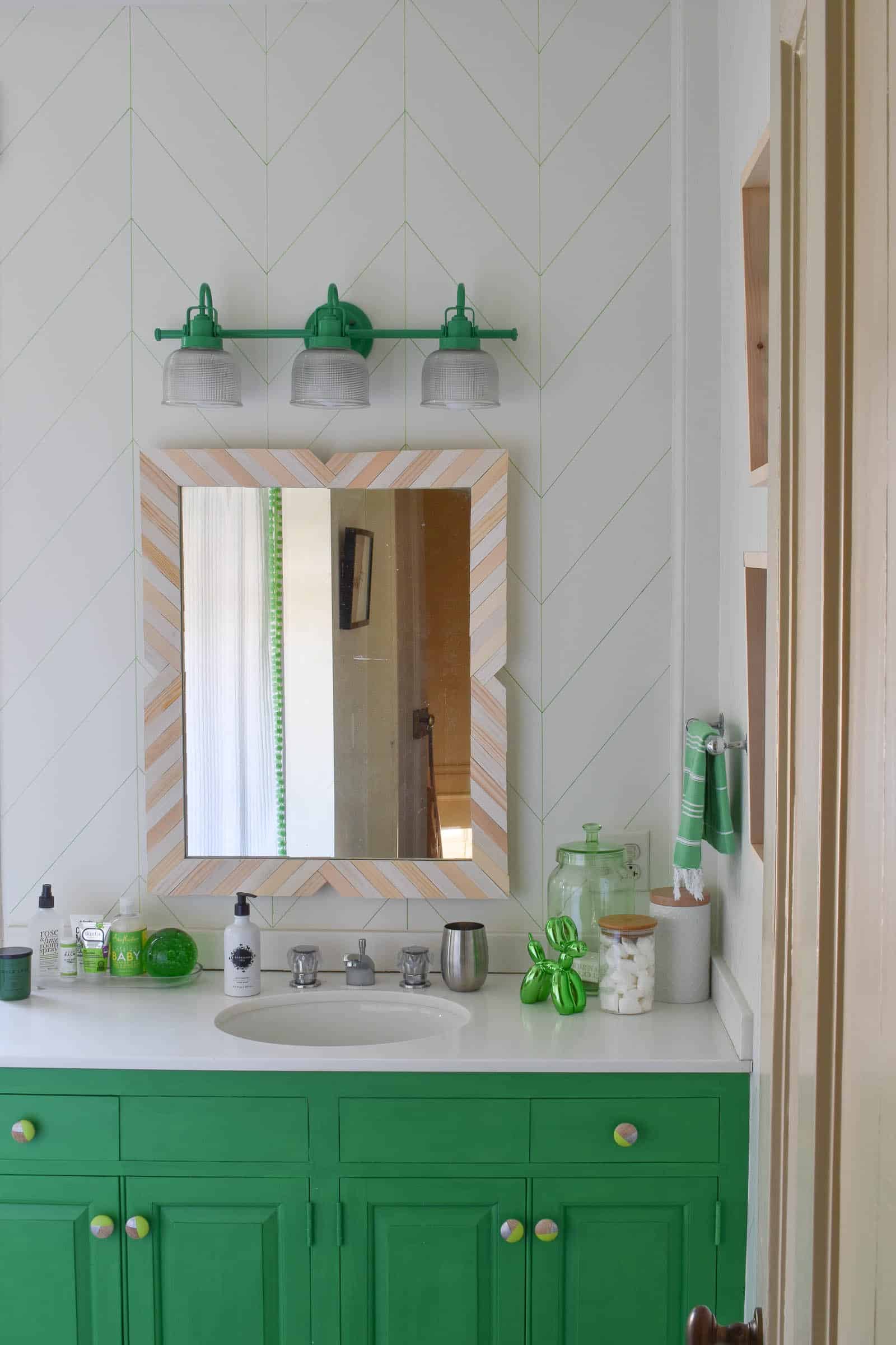 spray painted green light in bathroom