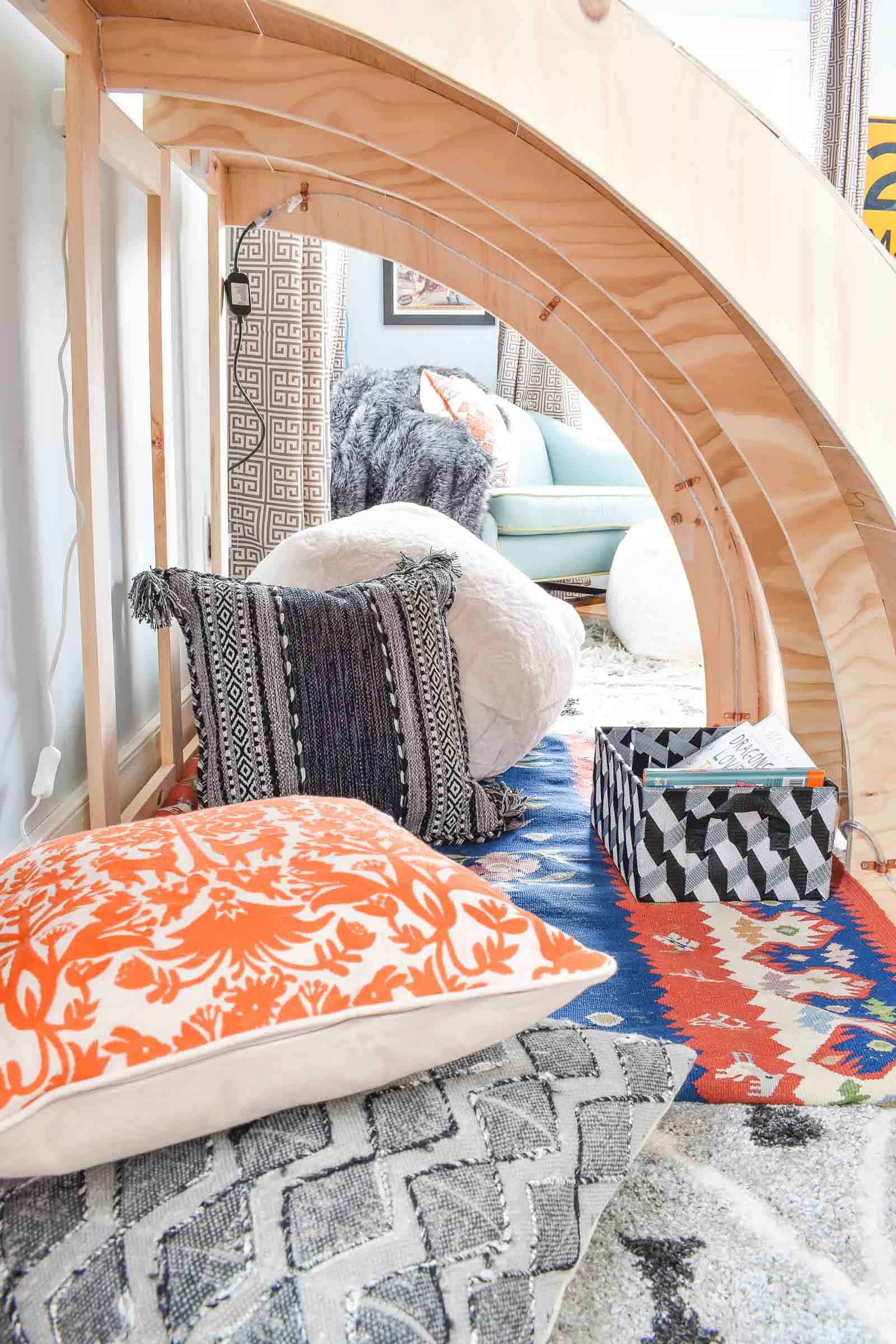 reading nook with cozy blankets and storage