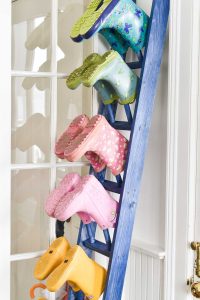 rungs on boot rack with blue stain