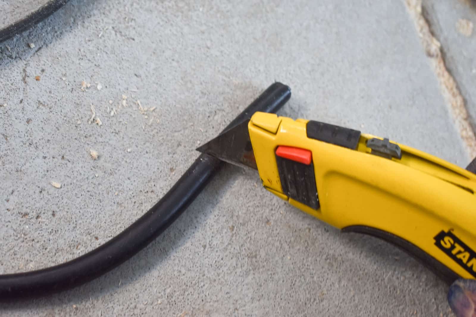 use utility knife to cut through wire