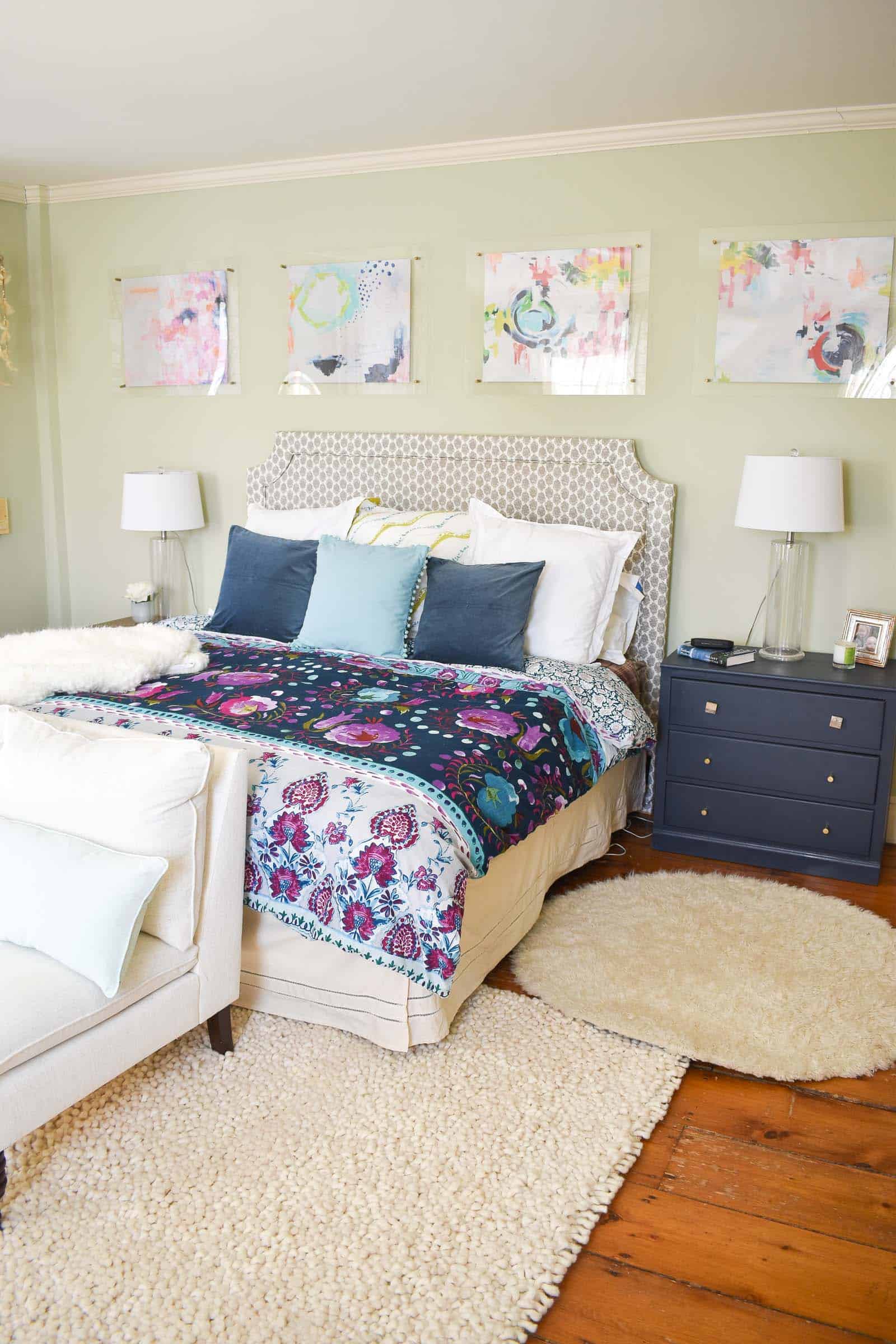 layered rugs in master bedroom