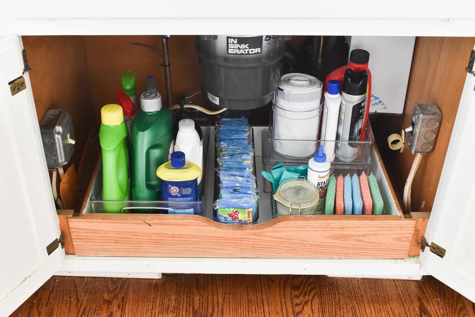 clutter under the sink after