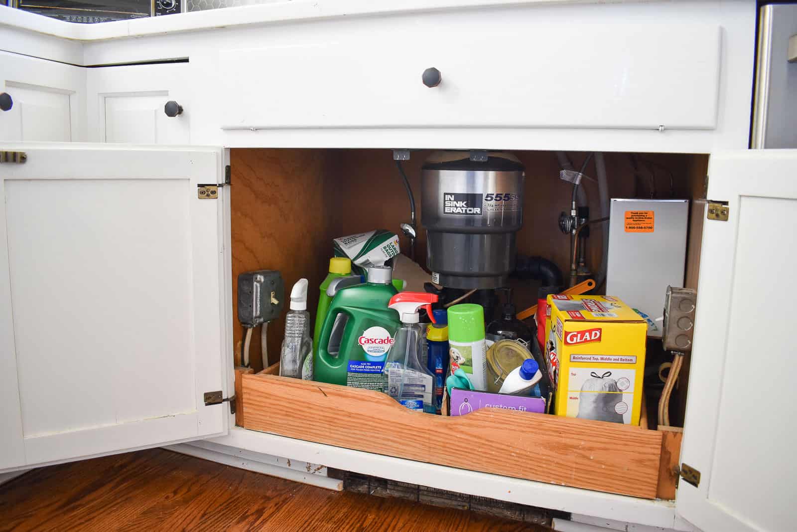 clutter underneath our sink before