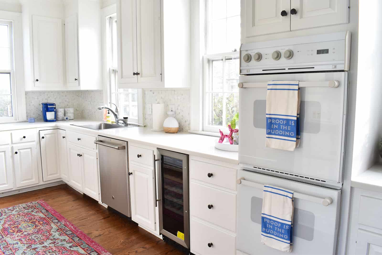 white bright kitchen with new GE dishwasher