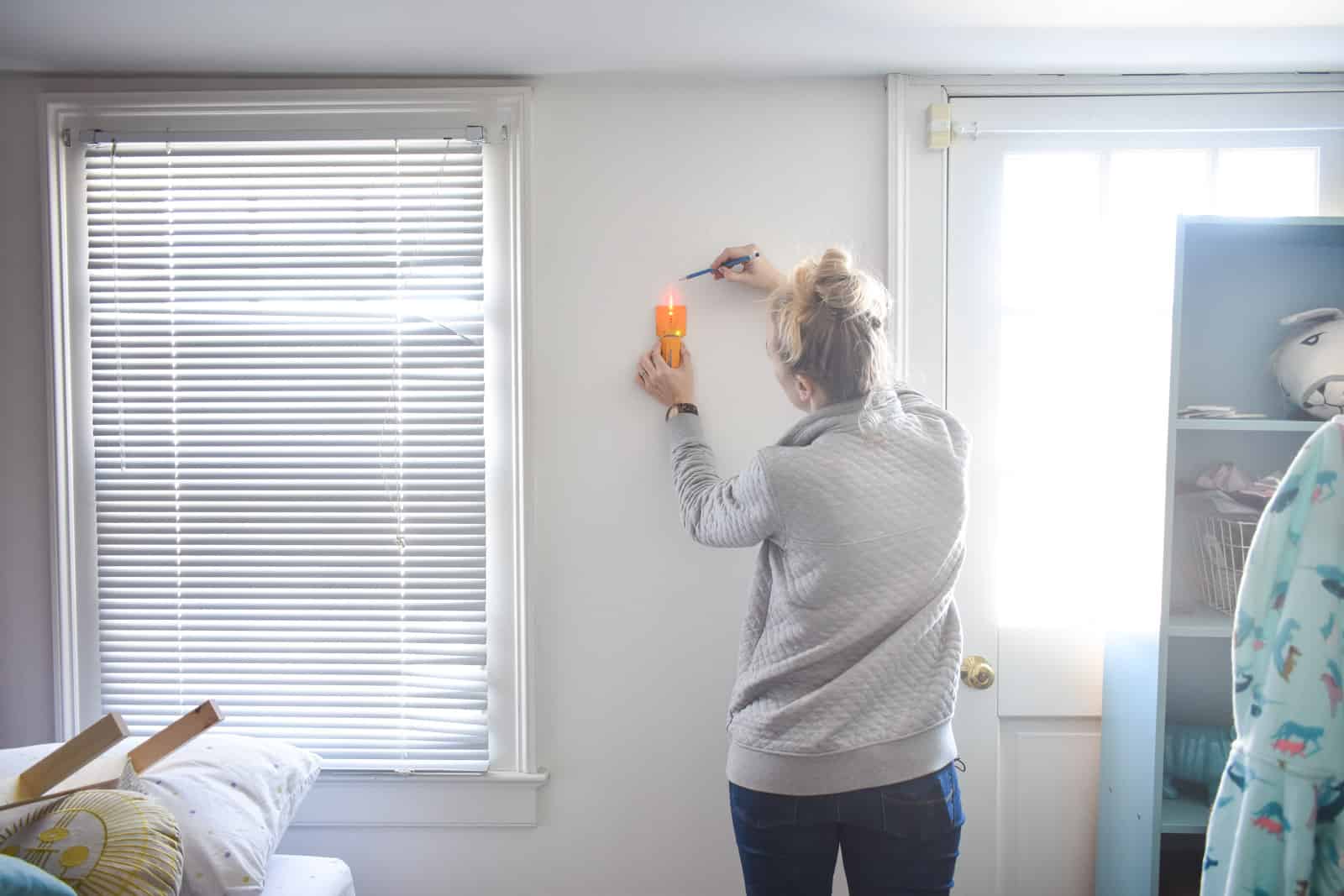 use stud finder to attach brackets