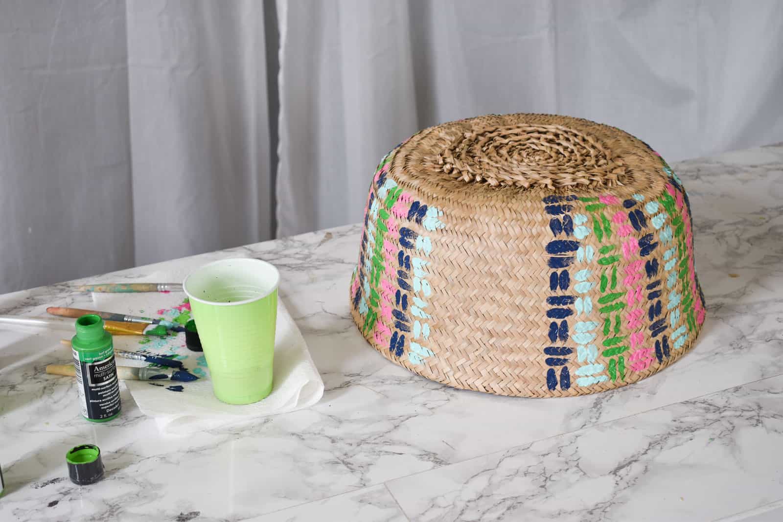 folded basket with painted pattern