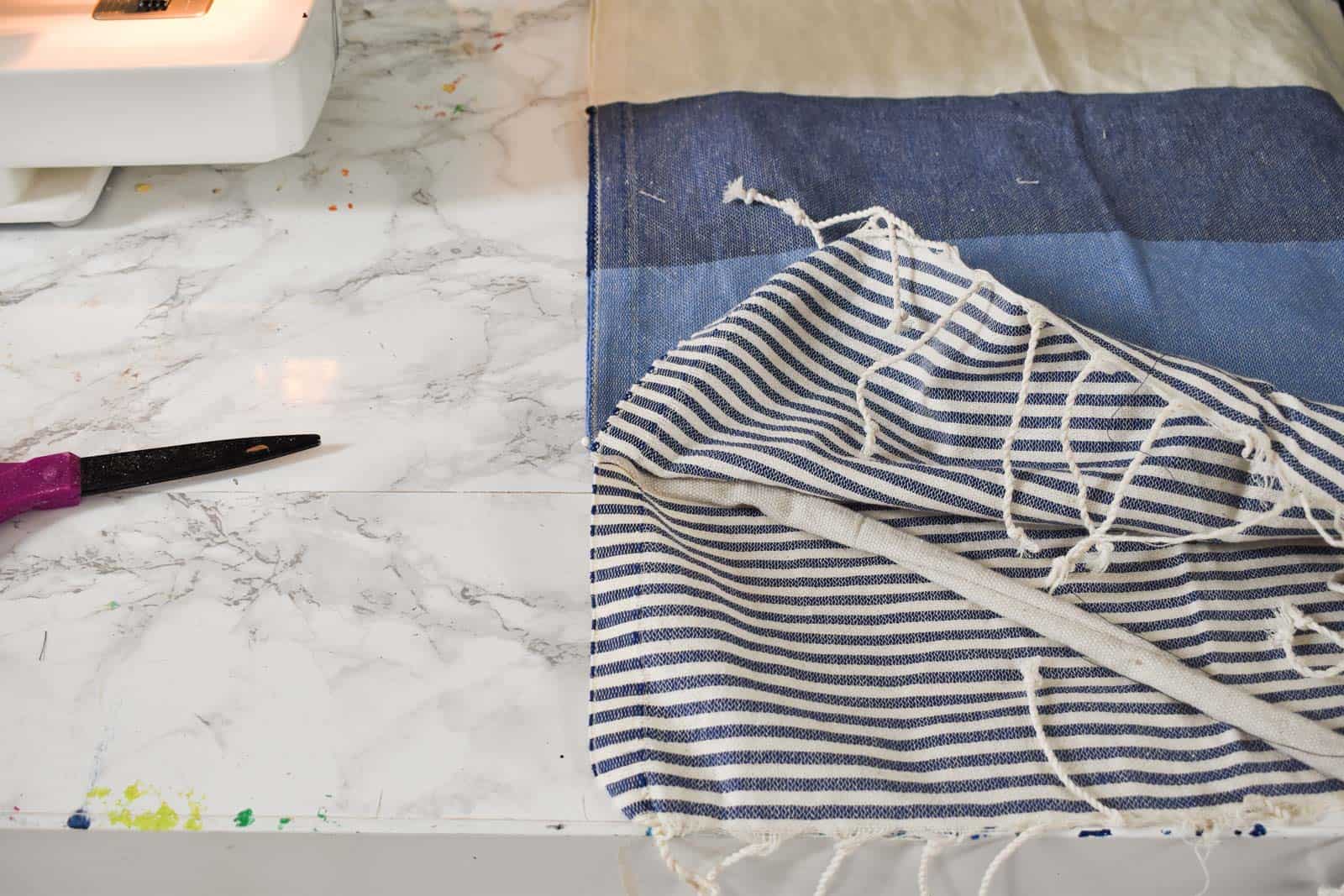 sew tabs onto turkish towel cover