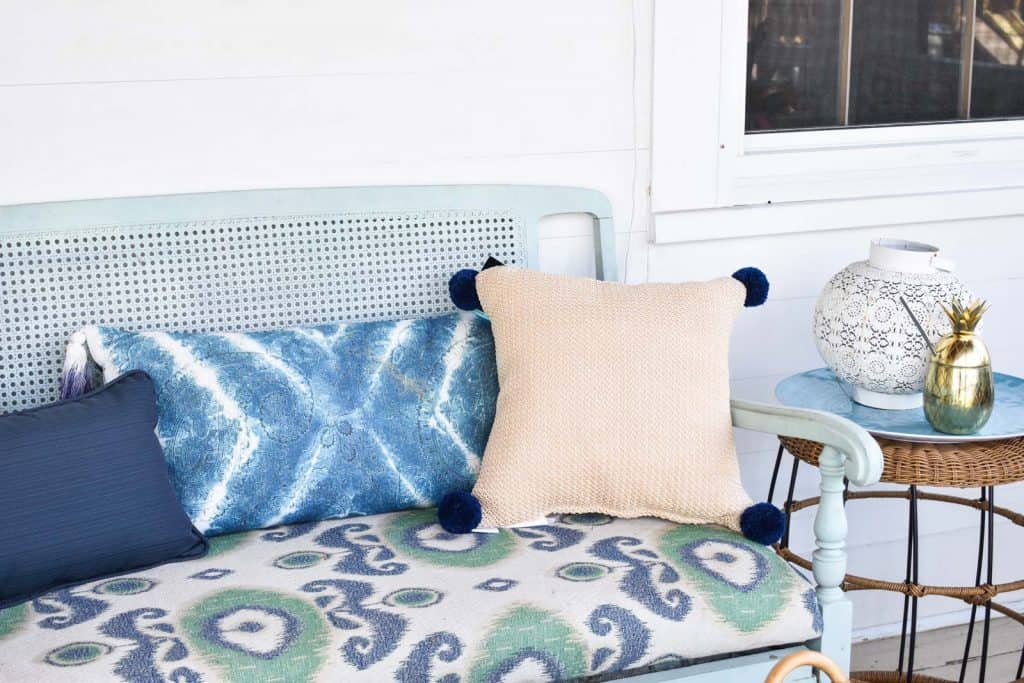 straw pillow on coastal porch