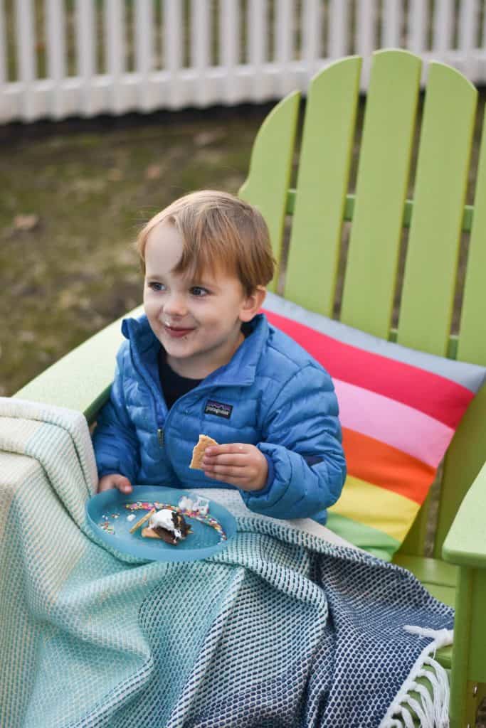 enjoying our fire pit, our rainbow furniture and s'mores