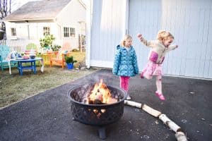enjoying our fire pit, our rainbow furniture and s'mores